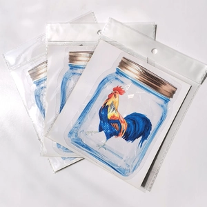Three packs of rainbow suncatcher prism stickers featuring colorful rooster in mason jar motif