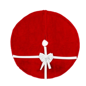 Red plush Christmas tree skirt with white ribbon bows on a clean white background