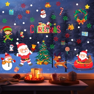 Detailed view of Christmas window stickers featuring Santa Claus and reindeer on glass surface