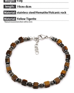 Detail of beaded bracelet showing Yellow Tigerite, Hematite, and Volcanic rock beads