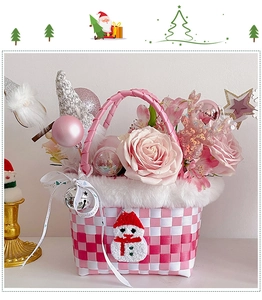 Pink Christmas apple gift basket with plush roses and festive snowman decorations