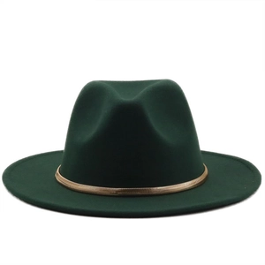 Close-up of dark green wool fedora with gold chain decorative band for autumn winter