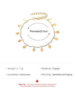 Detalle de una tobillera de cobre dorado con corazones y especificaciones de 25,5 cm
