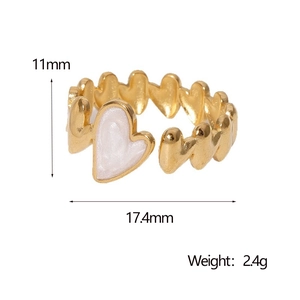 Macro detail of golden heart ring with dimensions showing 11mm height and 17.4mm inner diameter
