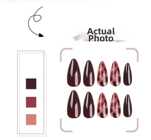 Detail of 10-piece long almond press-on nails with dark red and marble texture