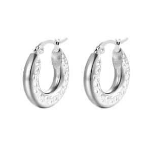 Polished silver stainless steel hoop earrings with hammered texture and hinged clasp