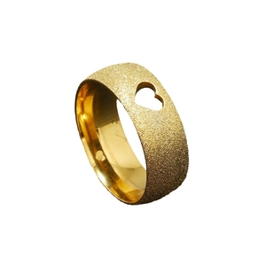 Golden stainless steel frosted heart ring with cutout design and polished inner band