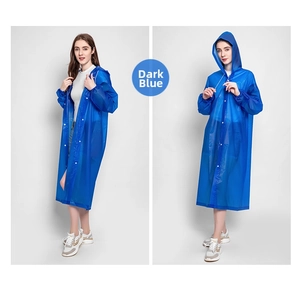 Detail of dark blue thick EVA raincoat with drawstring hood and elastic cuffs