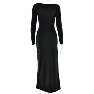 Back view of a sleek black high-slit long-sleeve maxi dress on a professional mannequin
