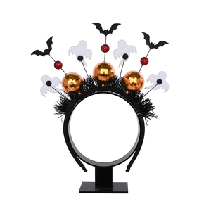 Halloween headband with orange disco balls, black bats, and white ghosts on a black stand