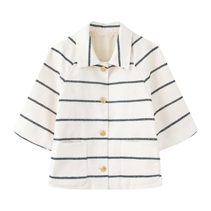 Short-sleeve navy striped tweed knit top with elegant gold buttons and patch pockets