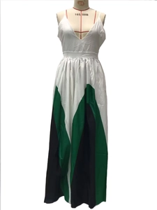 Detailed close-up of the tri-color patchwork maxi dress with V-neck and pleated hemline