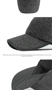 Detail of reinforced brim on winter herringbone newsboy cap with adjustable curve feature