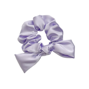 Elegant lavender satin scrunchie with bow detail for women on plain white background
