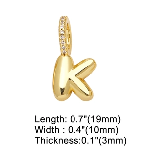 Detail of gold letter K pendant with clear gems showing size 19mm x 10mm dimensions