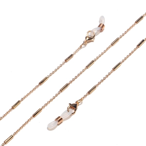 Minimalist gold-tone metal eyewear chain featuring cylindrical tube links and rubber loops