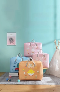 Detailed view of waterproof cartoon storage bags in multiple colors for kids bedding