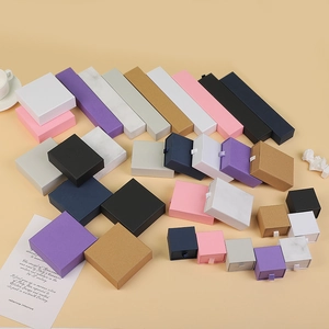Various colored drawer and lid jewelry gift boxes for rings and bracelets sets