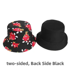 Reversible bucket hat with cartoon dragon fruit print and solid black side for sun protection