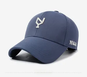 Detailed side view of navy blue baseball cap featuring white NY&JA side embroidery
