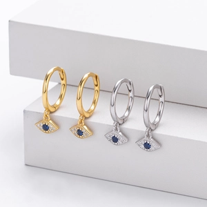 Detailed close-up of S925 silver evil eye hoop earrings with blue stones and crystals