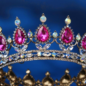 Macro shot of baroque bridal crown with pink teardrop gems and sparkling crystals
