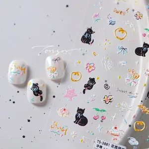 Detail of 3D embossed nail stickers featuring garden cats, tulips and sweet patterns