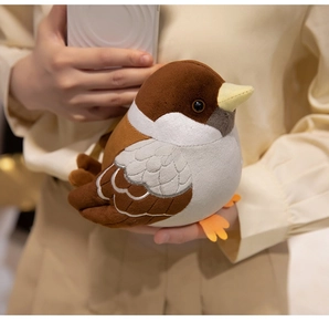 Close-up of a cute sparrow plush toy featuring soft textures and round cartoon design