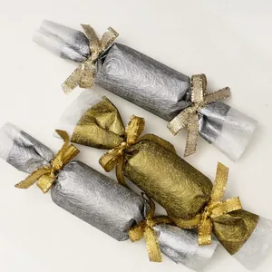 Glittering gold and silver metallic ribbons used for elegant gift wrap packaging