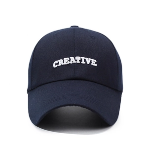 Navy blue baseball cap with white CREATIVE embroidery and long brim for sun protection