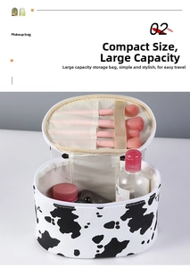 Detail view of cow print makeup bag with brush slots and large internal capacity