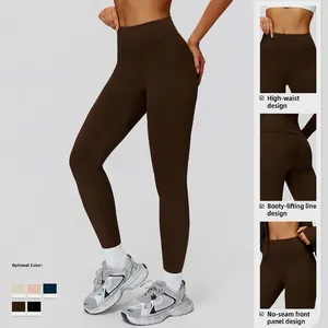 High-waisted brown yoga leggings with slimming tummy control and seamless front design