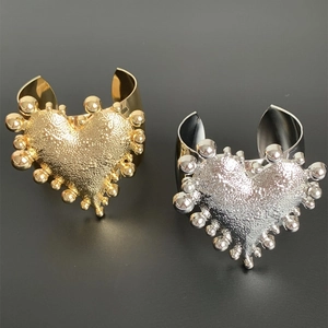 Retro wide open metal cuff bracelets with hammered heart design in gold and silver finish
