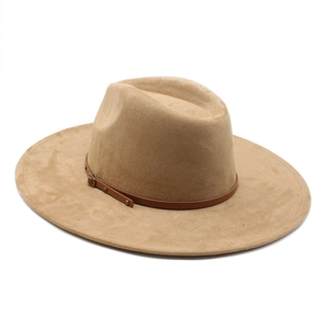 Detail of camel wool fedora hat featuring wide brim and leather band with metal buckle