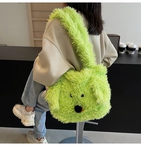Fuzzy neon green plush shoulder bag with a cute cartoon dog face on a casual indoor setting