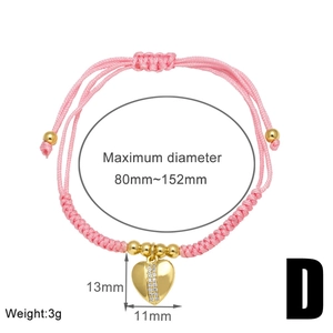 Detailed view of pink braided cord bracelet with gold heart pendant and size dimensions