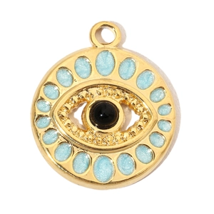 Macro shot of evil eye pendant with light blue enamel and black stone in gold steel