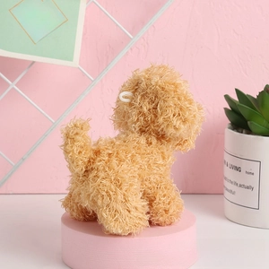 Close-up of cute light brown puppy plush toy with soft lamb wool texture on a pink background