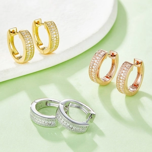 Three-row pavé moissanite hoop earrings in gold, silver, and rose gold finishes