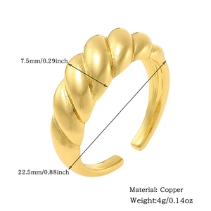 Detail view of 18K gold plated copper spiral ring with 7.5mm width and 22.5mm inner diameter