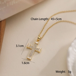 Detail shot of 18K gold plated cross necklace with zircon dimensions and chain length