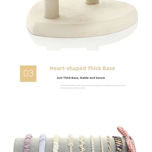 Detail view of velvet headband holder with heart-shaped base and multi-style display