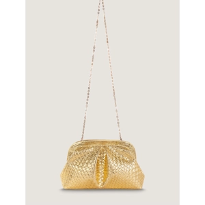 Detail of gold woven leather texture and metal chain strap on minimalist dumpling bag