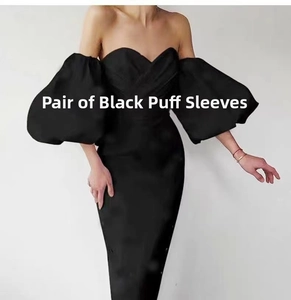 Detail shot of elegant black satin puff sleeves as accessories for wedding dresses