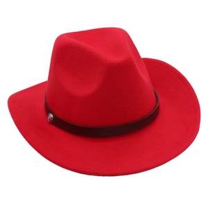 Detail of red wool felt cowboy hat featuring a brown leather band and silver metal buckle