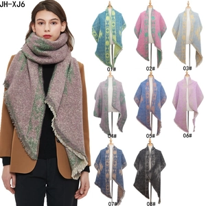Thick knit winter scarf with geometric patterns and fringe edges in eight colors