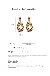 Detailed view of large gold-tone irregular crinkle geometric earrings with size specs