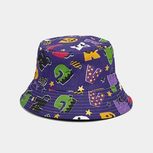 Detail of purple Halloween bucket hat with colorful cartoon prints and stitched brim