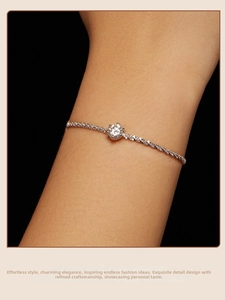 Close-up of minimalist S925 sterling silver bracelet featuring a 1ct moissanite solitaire