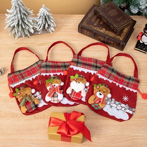 Set of 4 Christmas drawstring gift bags with Santa Snowman Reindeer and Bear designs
